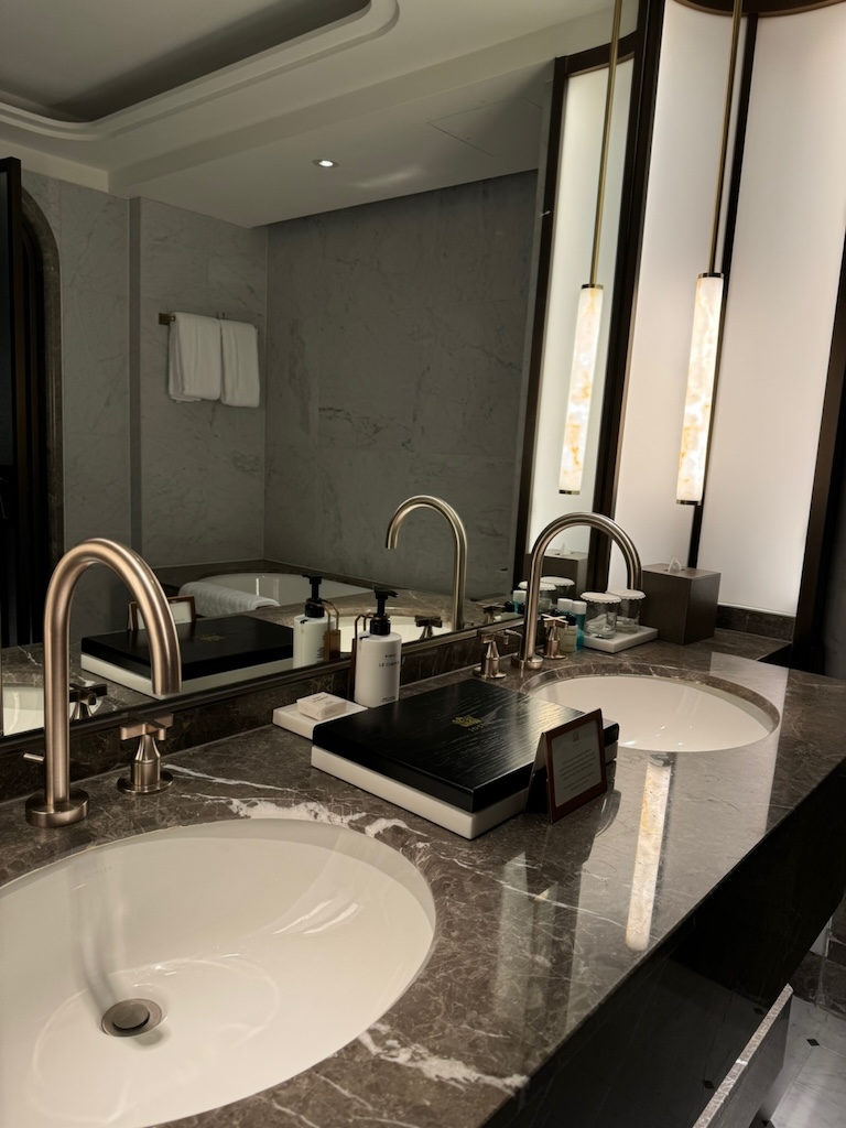 a bathroom with a large mirror