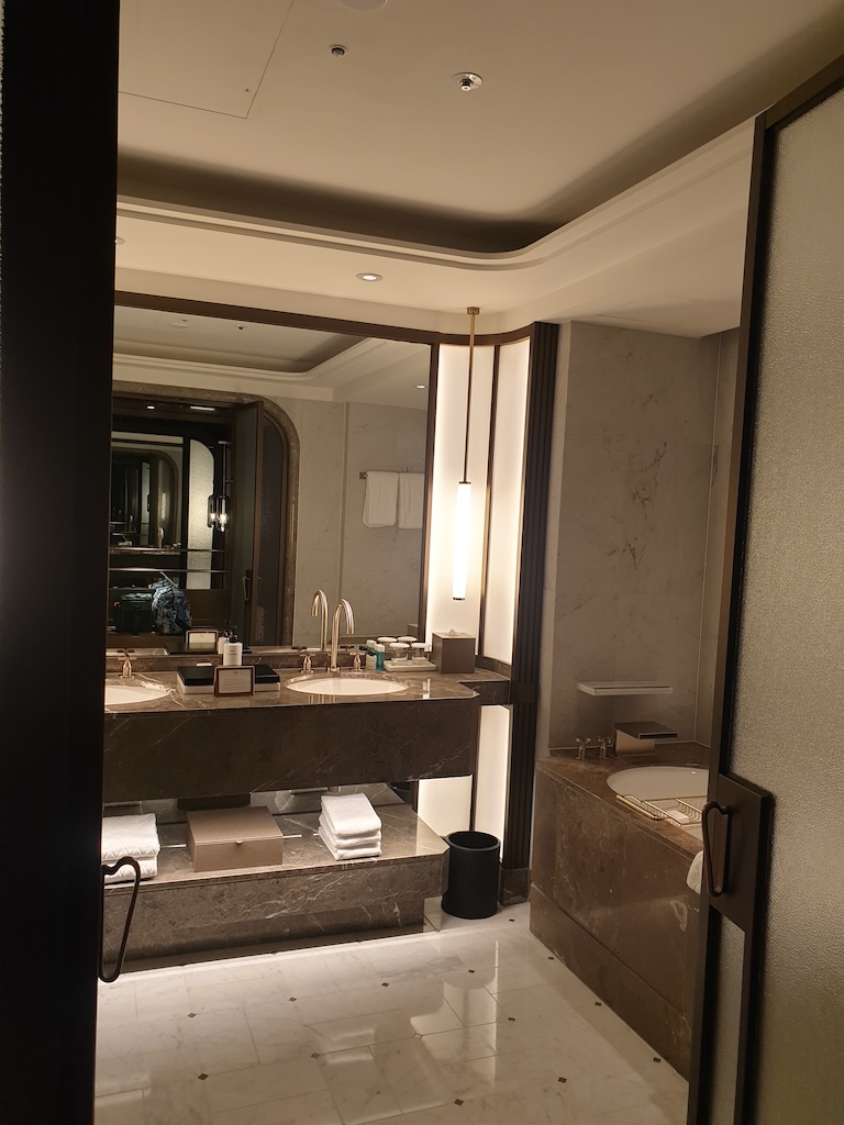 a bathroom with a large mirror