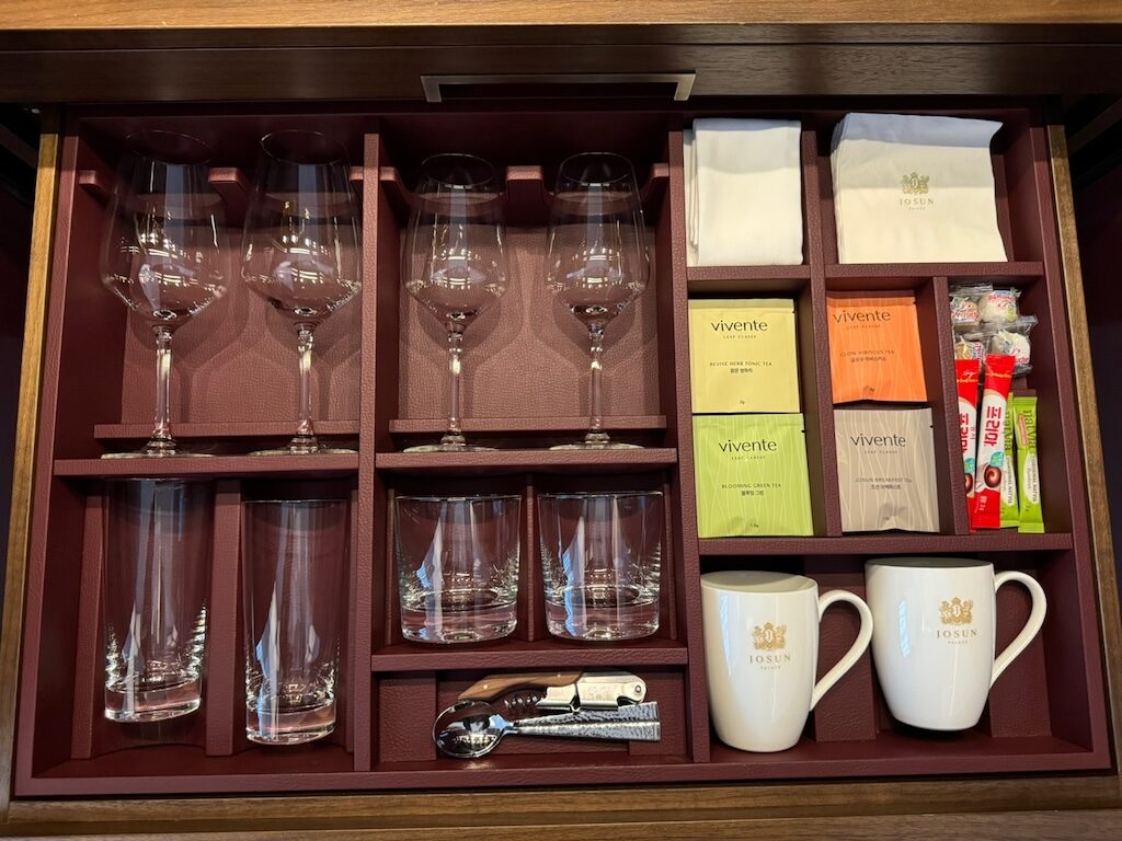 a glass cabinet with various items