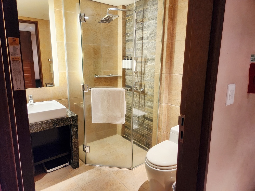 a bathroom with a glass shower