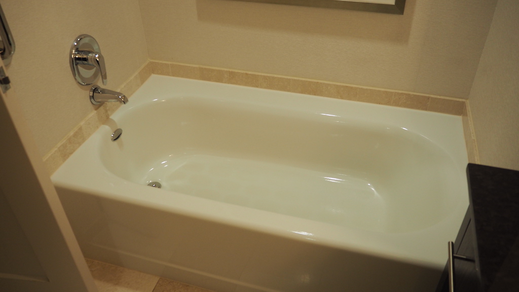 a bathtub with a faucet