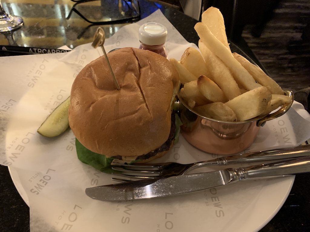 a burger and fries on a plate