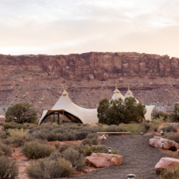 a group of tents in a desert