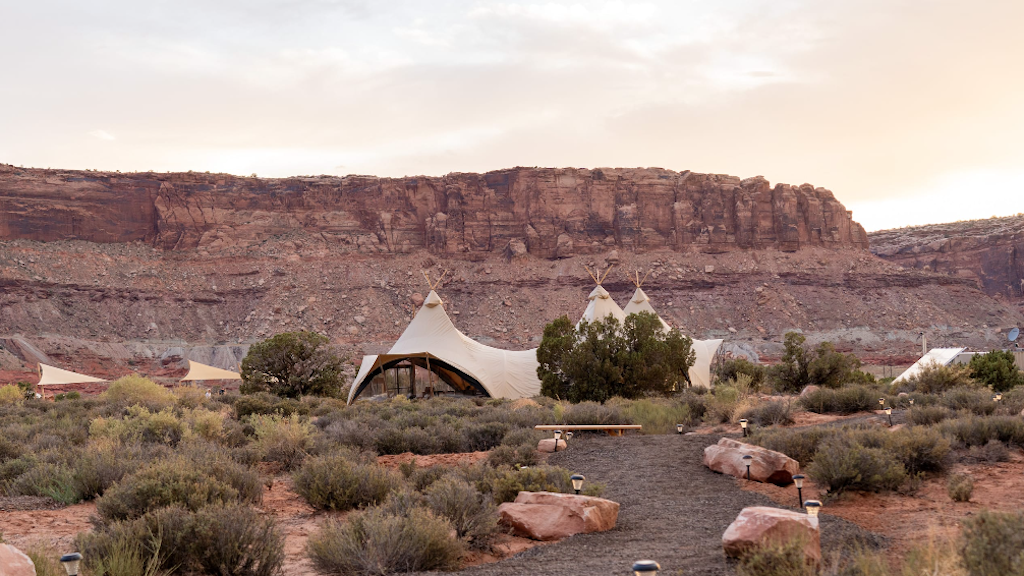 a group of tents in a desert