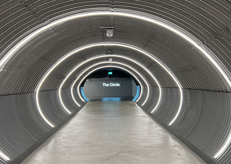 a tunnel with a sign