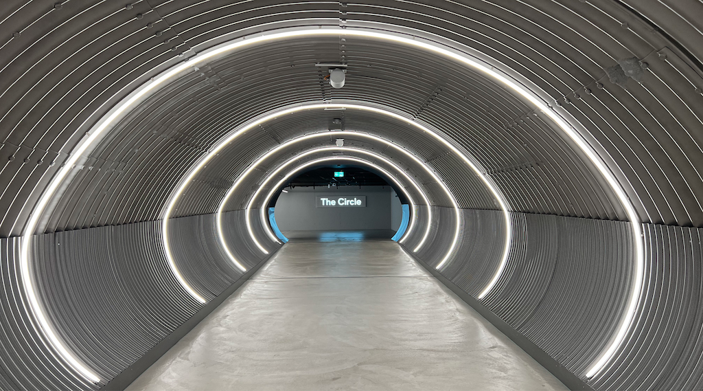 a tunnel with a sign