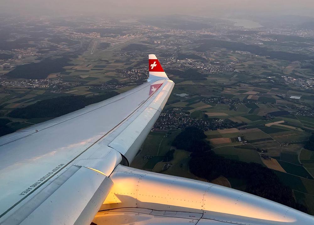 an airplane wing in the sky