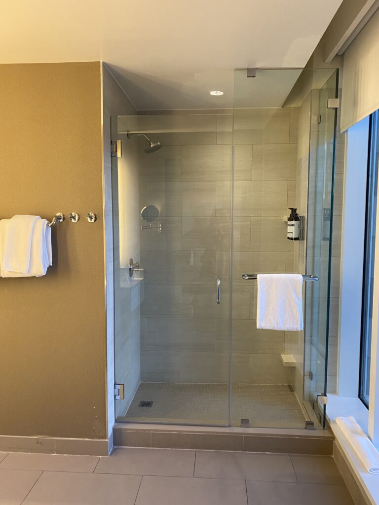 a bathroom with a glass shower