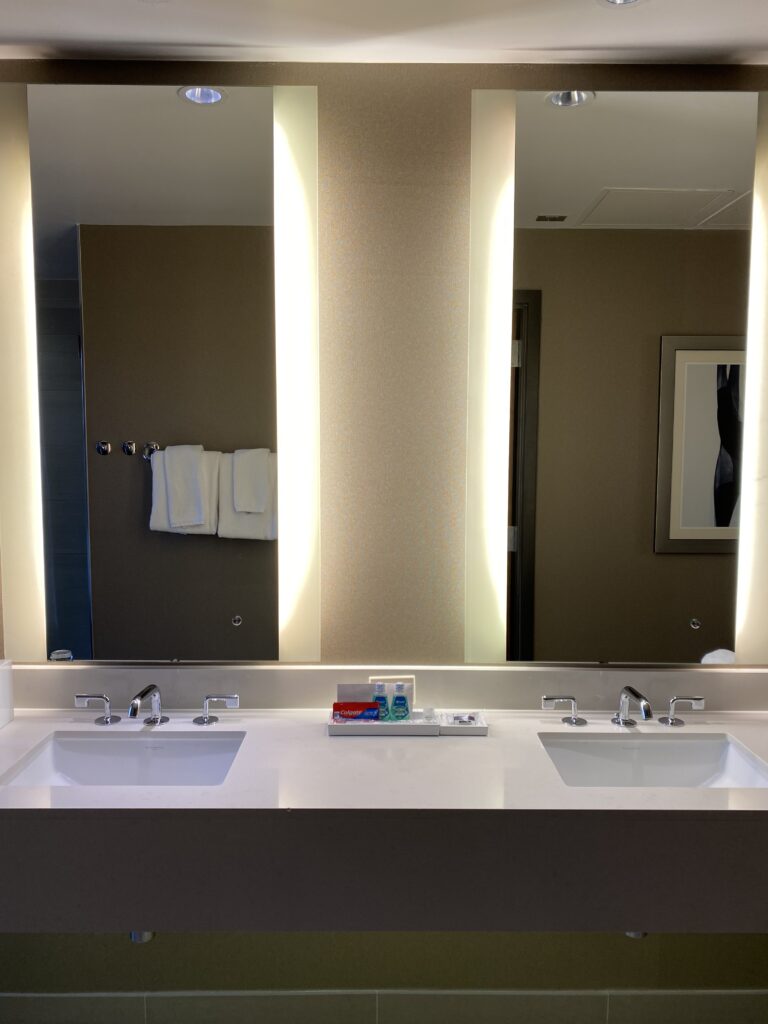 a bathroom with a large mirror