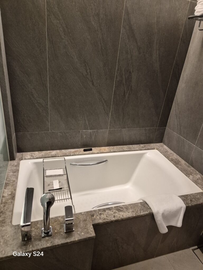 a bathroom with a large tub