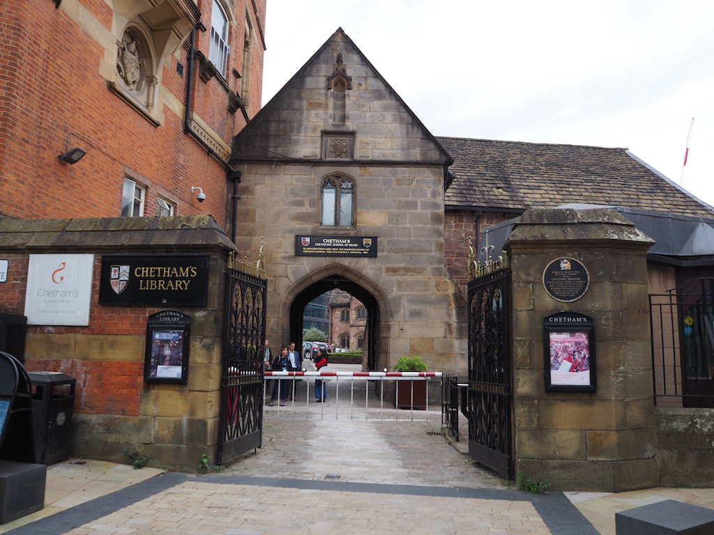 a brick building with a gate