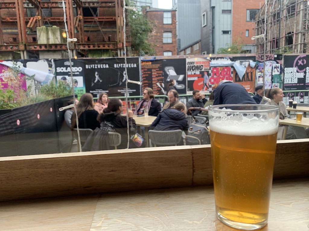 a glass of beer on a table