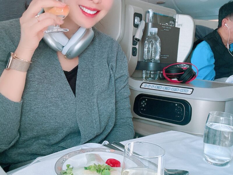 a woman holding a phone to her ear