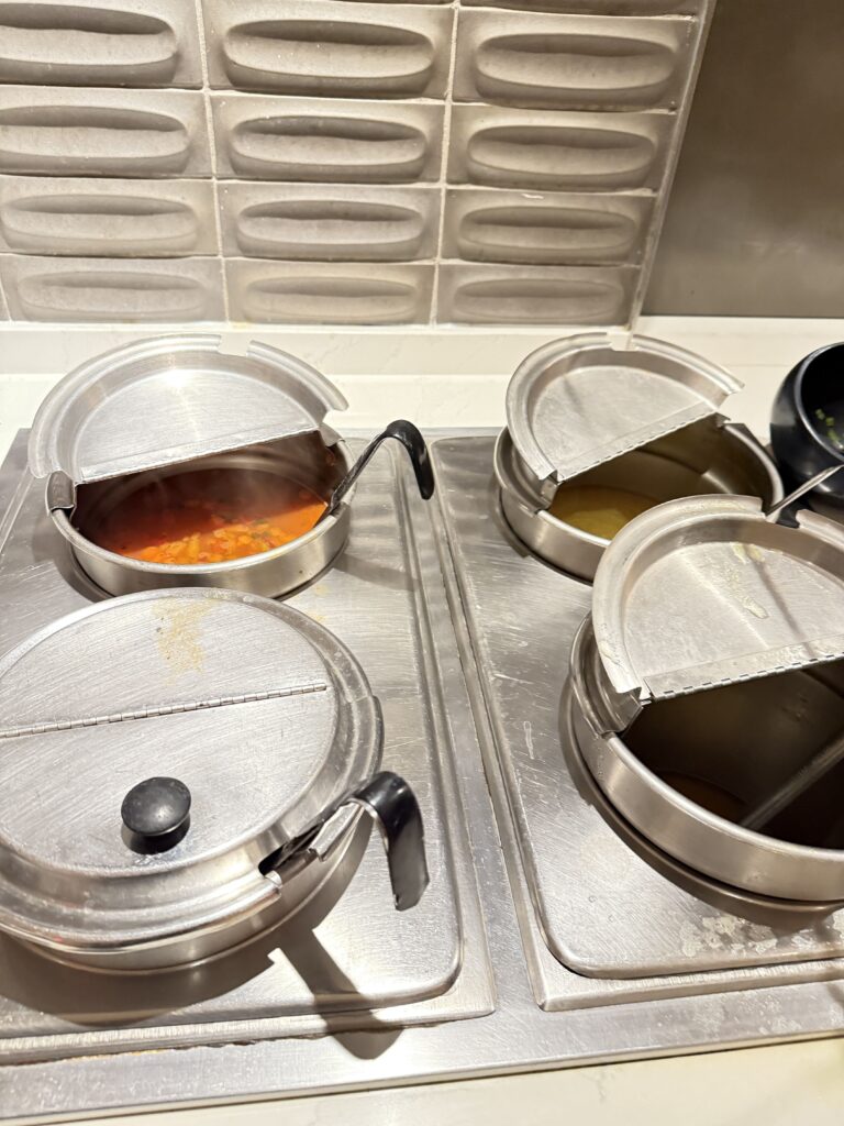 a group of pots and pans on a stove