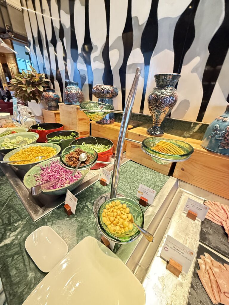 a table with many bowls of food