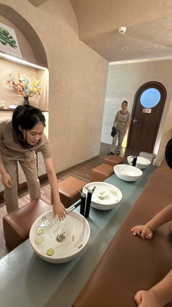 a woman cutting a cake