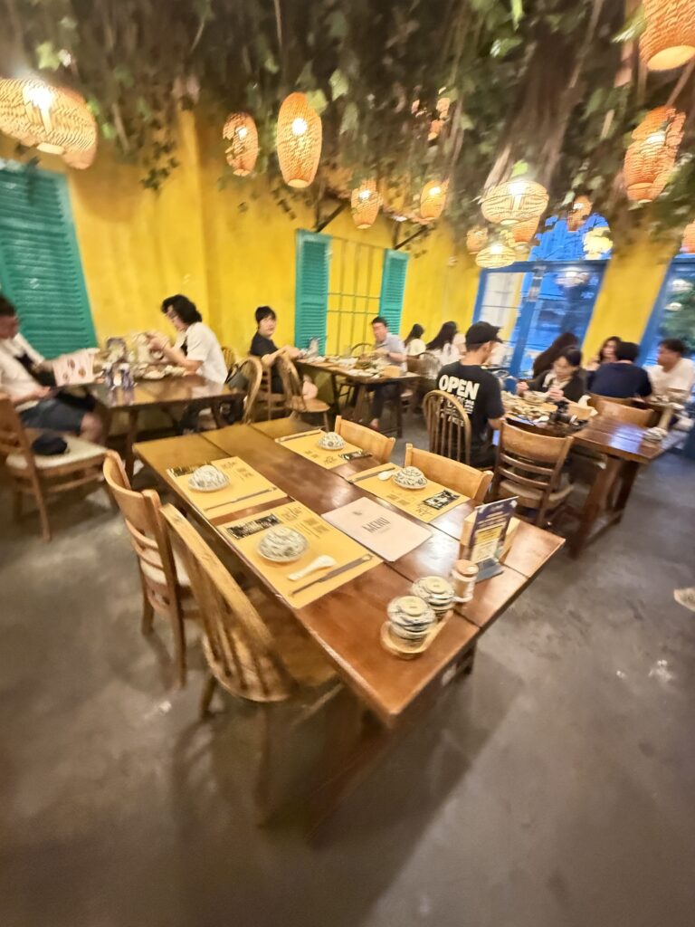 a group of people sitting at tables