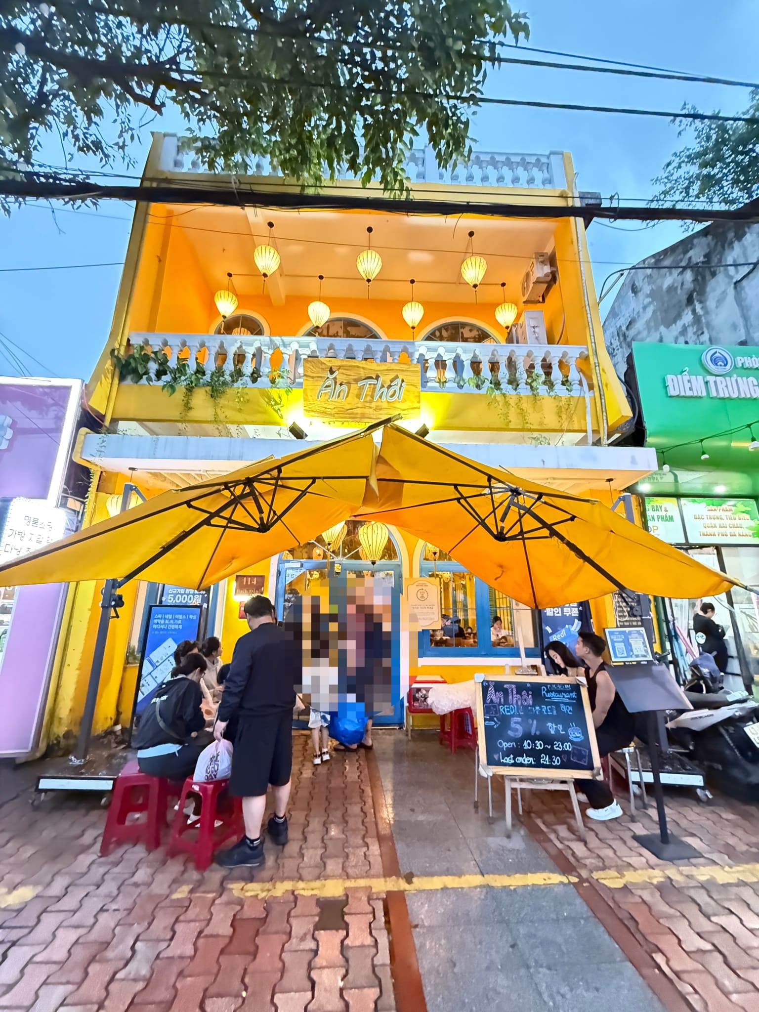 a yellow canopy with lights