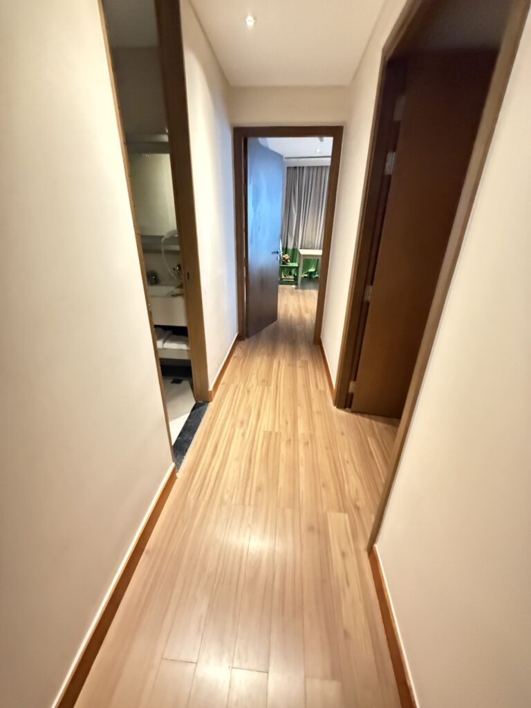 a hallway with wood floors