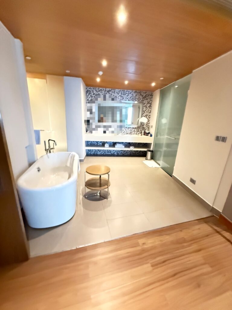 a bathroom with a tub and sink