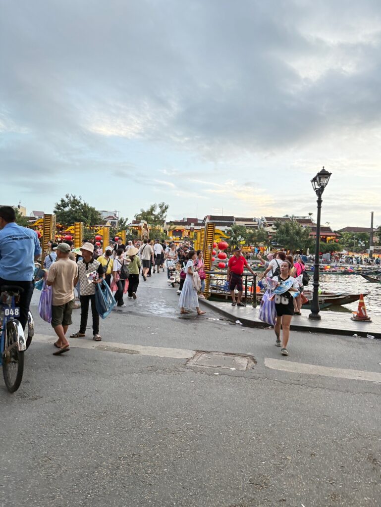 a group of people walking on a street