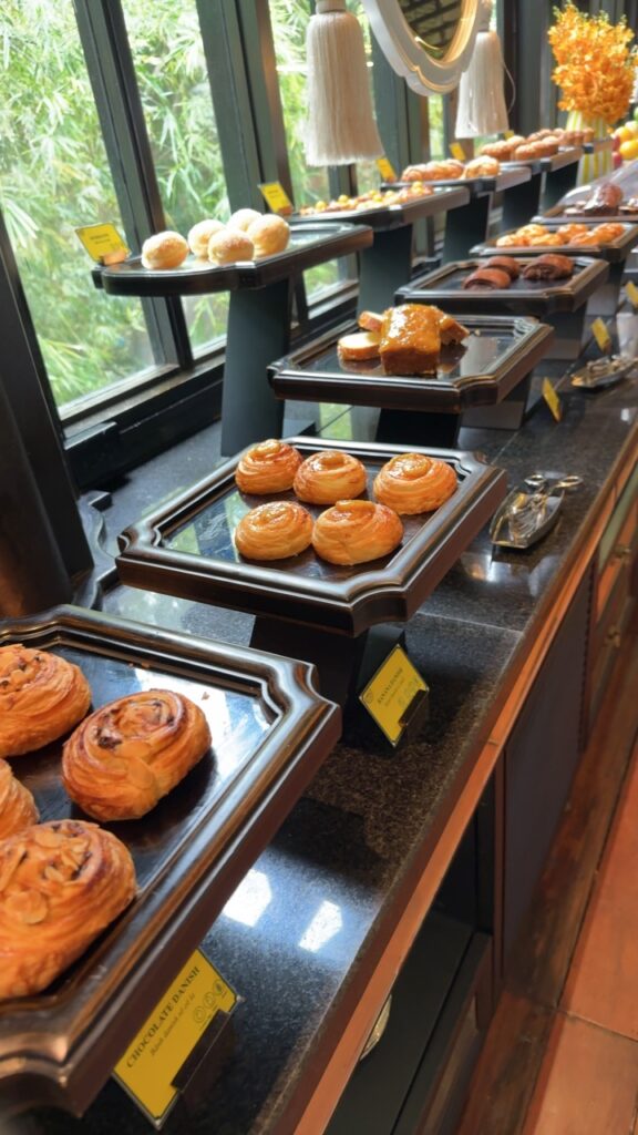 a bakery display with donuts