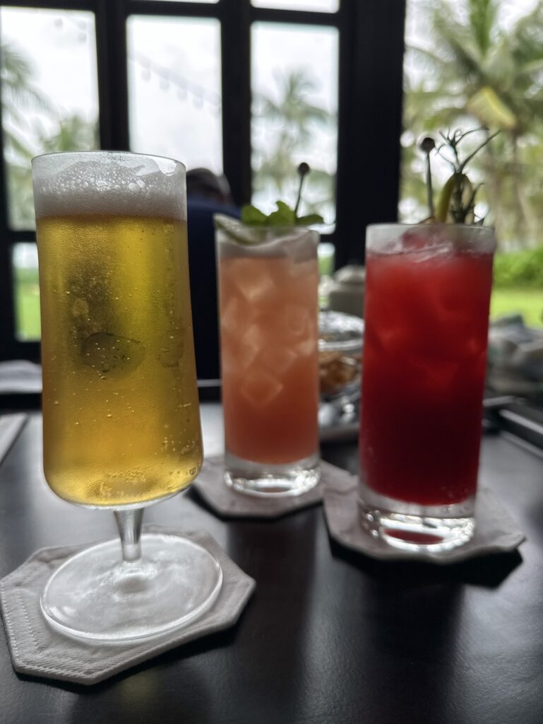 a group of glasses with liquid in them