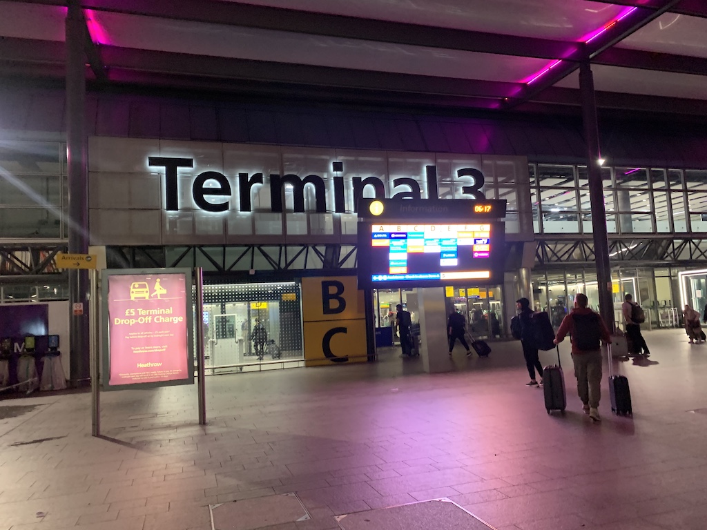 people with luggage in a terminal