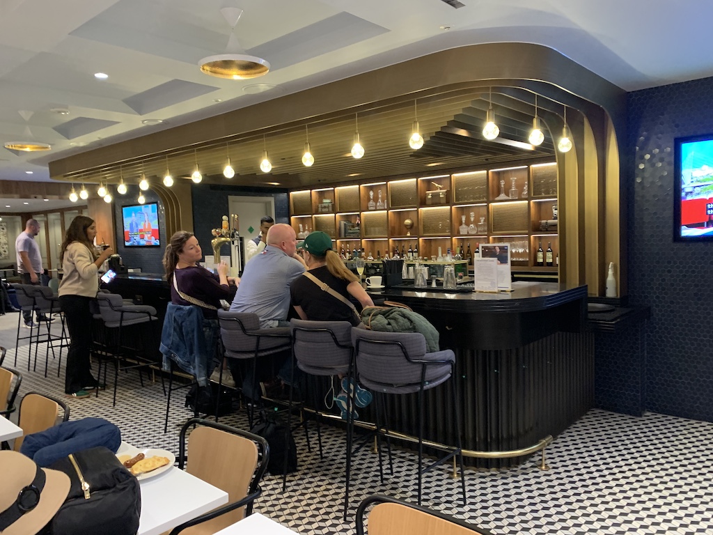 a group of people sitting at tables