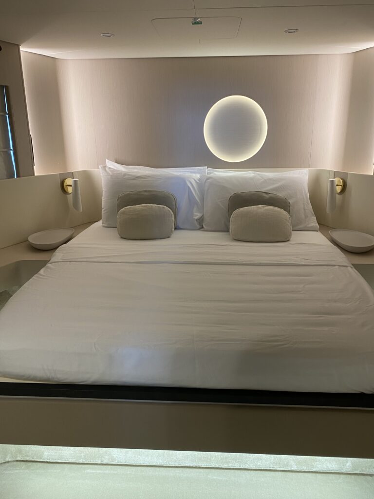 a bed with white pillows