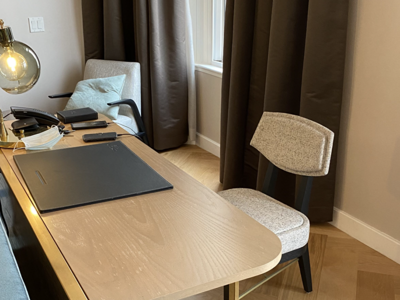 a desk with a laptop on it